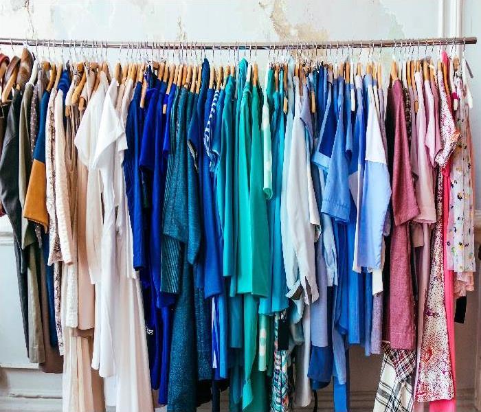 women's dresses on hangers in a boutique